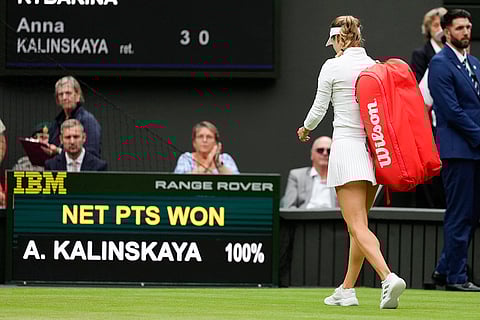 Anna Kalinskaya of Russia walks from centre Court